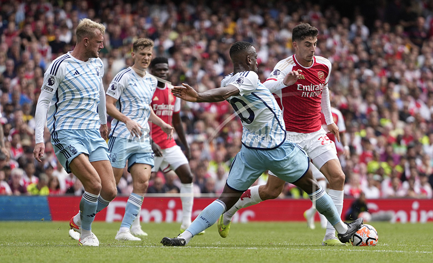 Arsenal's Kai Havertz, right, and Nottingham Forest's Willy Boly vie for the ball during the English Premier League soccer match between Arsenal and Nottingham Forest at Emirates stadium in London, Saturday, Aug. 12, 2023. (AP Photo/Kirsty Wigglesworth)